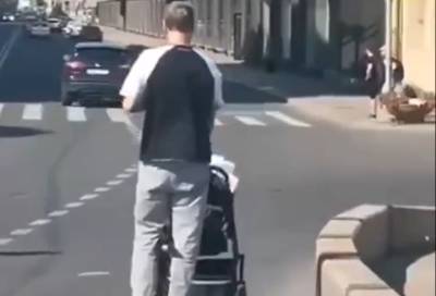 «Чтобы жена увидела»: нерадивый отец на гироскутере разъезжает по дорогам Петербурга с ребенком в коляске – видео