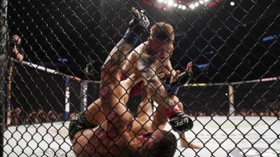 "Этот поединок не завершился": президент UFC не исключил четвертого боя Макгрегора и Порье