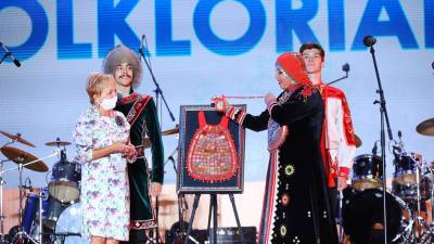 В Башкирии создали уникальное украшение с монетами стран-участниц Фольклориады