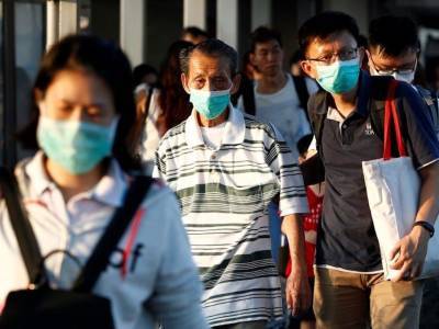 Сингапур смягчает ограничения, введенные из-за штамма коронавируса "дельта"