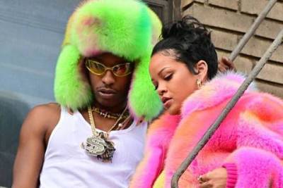 Образ дня: Рианна в цветной шубе и A$AP Rocky в ушанке на съемках клипа в жарком Нью-Йорке
