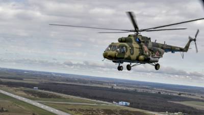 Экипажи вертолетов ВКС России спасли от лесного пожара деревню в Сирии