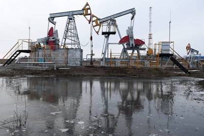 Нефть ускорила рост на оптимистичном докладе МЭА