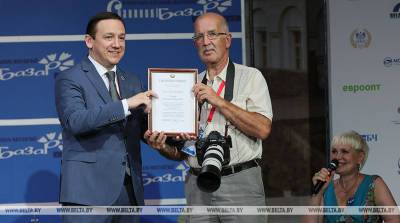 Фотокорреспондент БЕЛТА награжден почетной грамотой Мининформа за освещение "Славянского базара"