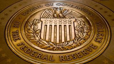ФРС: экономика США продолжает укрепляться