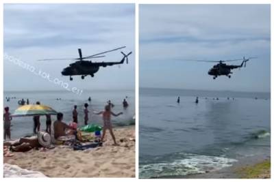 "Сдувает кепки": над пляжами под Одессой кружат вертолеты, видео