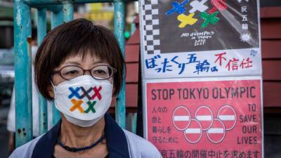 Хроники коронавируса: французы митингуют, Япония готовится к Играм