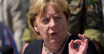 Меркель призвала к более решительной борьбе с изменением климата после сильнейших наводнений