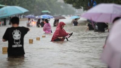 Наводнение в китайской провинции Хэнань разрушило плотину водохранилища