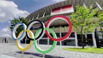 Первые соревнования Летних Олимпийских игр за два дня до церемония открытия прошли в Японии