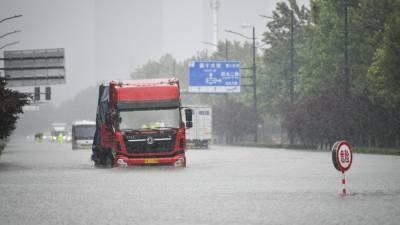 Спасатели эвакуировали 200 тыс. человек на востоке КНР из-за наводнения