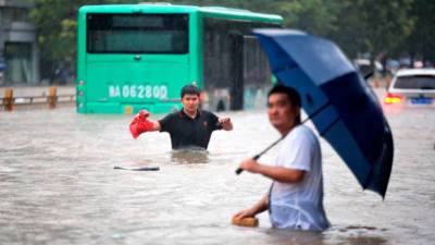 Из-за наводнения в Китае погибли более 25 человек