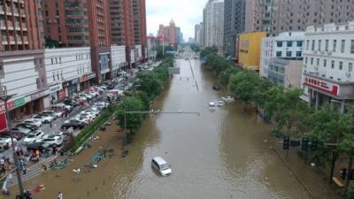 В центре Китая жертвами наводнений стали не менее 25 человек