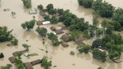 Количество погибших при наводнении в Хэнани увеличилось до 33
