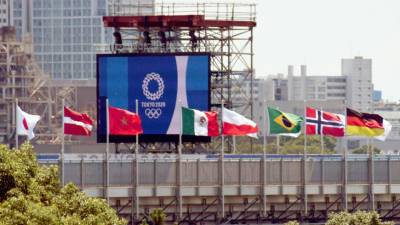 Спортдайджест: чирлидеры заряжают Токио позитивом, олимпийские лоты уйдут с молотка, Усейн Болт опасается за свои рекорды