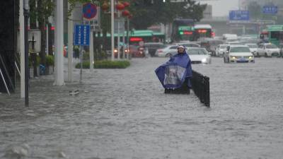Как минимум 33 человека погибли в разрушительных наводнениях в Китае
