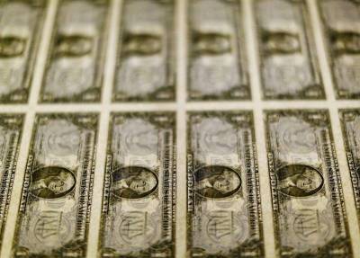 Доллар подрос в пятницу после смягчения тона ЕЦБ