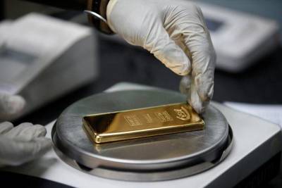 Цены на золото могут показать недельное снижение из-за укрепления доллара
