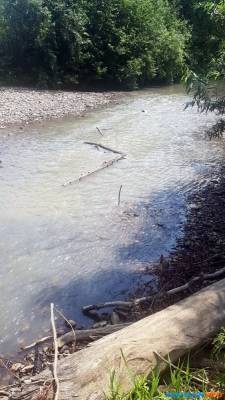 Обводной канал для реки Желтой, прорытый после оползня в Углегорском районе, не помог