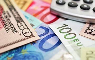Евро и доллар пошли вверх на первых торгах недели