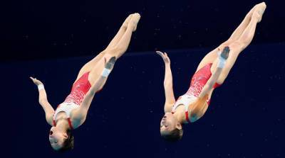Китаянки Юйси Чэнь и Цзяци Чжан выиграли Олимпиаду в синхронных прыжках с вышки - belta.by - Токио - Белоруссия