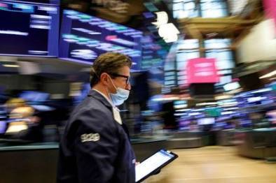 Уолл-стрит снизилась из-за осторожности инвесторов, ожидавших отчетности гигантов