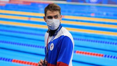 Пловец Колесников рассказал о впечатлениях от отсутствия гимна и флага на ОИ