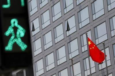 Китайские акции закрылись ростом на фоне попыток властей успокоить инвесторов