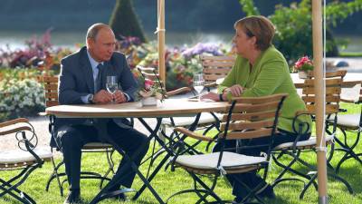 "Научились уважать друг друга": историк Боллман рассказал о переговорах Путина и Меркель