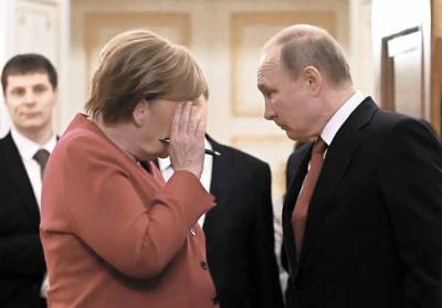 Биограф канцлера сообщил, что из-за Украины Меркель и Путин говорили на повышенных тонах