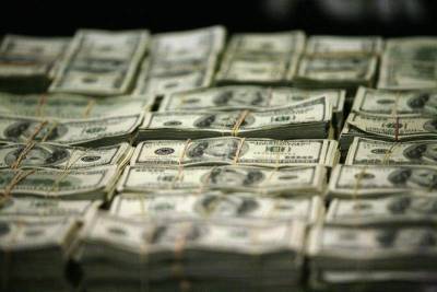 Средний курс доллара США со сроком расчетов "завтра" по итогам торгов составил 73,0579 руб.