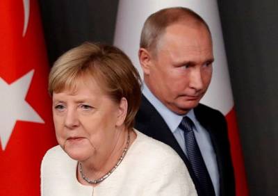 Биограф Меркель рассказал о поведении Путина в 2014 году