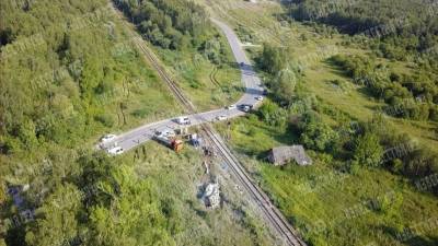 Последствия столкновения поезда с цементовозом под Калугой сняли с дрона