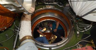 Опубликованы снимки первого входа экипажа в модуль "Наука" на МКС