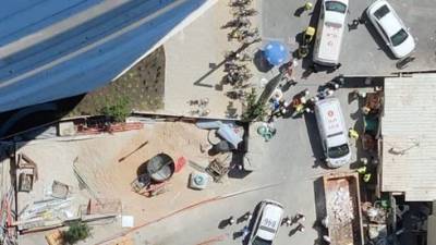 В центре Тель-Авива при падении с большой высоты погиб строитель