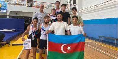 Азербайджанские гимнасты заняли призовые места на турнире по прыжкам на акробатической дорожке в России