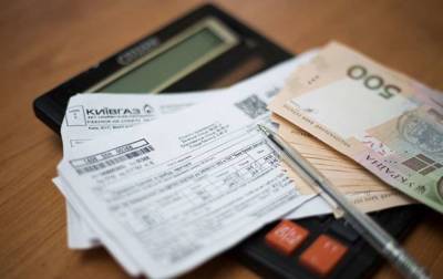С банковских счетов украинцев будут автоматом списываться долги за коммуналку