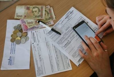 Банки будут автоматом списывать со счетов украинцев долги за коммуналку