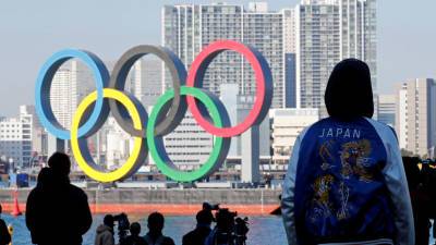 В Японии арестовали женщину, которая пыталась погасить Олимпийский огонь водяным пистолетом