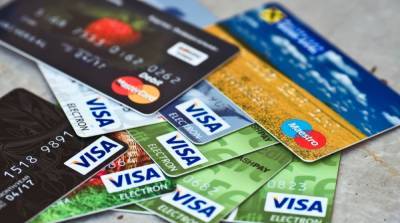 Автосписание долгов с банковских карт и счетов: в Минюсте рассказали детали