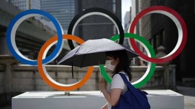 Есихидэ Сугой - Джо Байден - Байден поблагодарил премьера Японии за проведение Олимпиады-2020 - iz.ru - США - Токио - Израиль - Япония