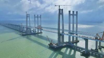 В Китае построили первый трансморской мост для высокоскоростных поездов — видео