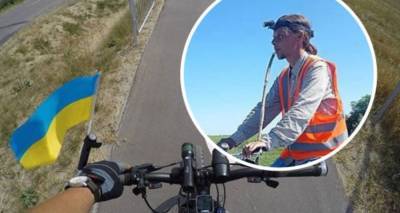 Украинец проехал почти 600 км на велосипеде, играя на дудке гимн: "Умею лучше всего"