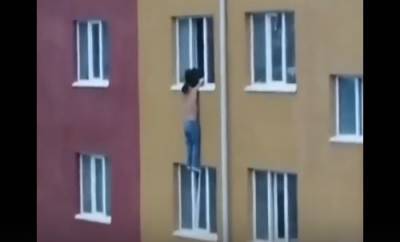 Чудесное спасение мужчины, выпавшего из окна во время семейной ссоры, попало на видео