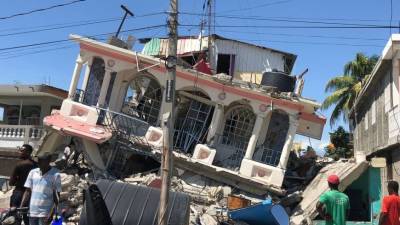 Число жертв землетрясения на Гаити выросло до 1297