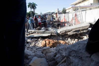 Жертвами мощного землетрясения на Гаити стали 1297 человек