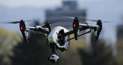 Летающий робокоп: дрон с тепловизором засек грабителей банка, прятавшихся от полиции на крыше (видео)