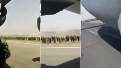 Сидел на самолете: новые страшные кадры от первого лица, как афганцы улетали из аэропорта Кабула