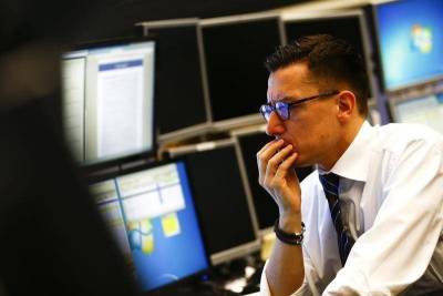 Европейские рынки акций закрылись в пятницу в минусе