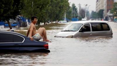 Число жертв наводнения в китайской провинции Хэнань увеличилось до 302